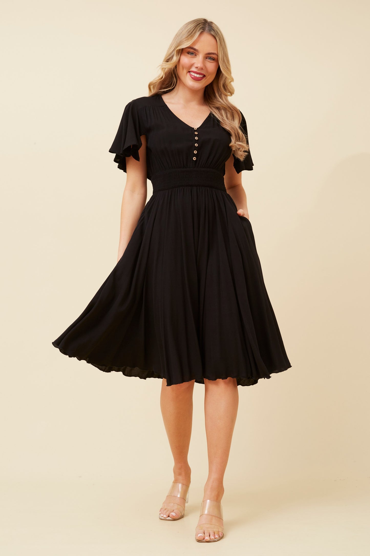 Black Flutter Sleeve Midi Dress - Caroline Morgan Clothing - Sale prices all day every day!  Elora